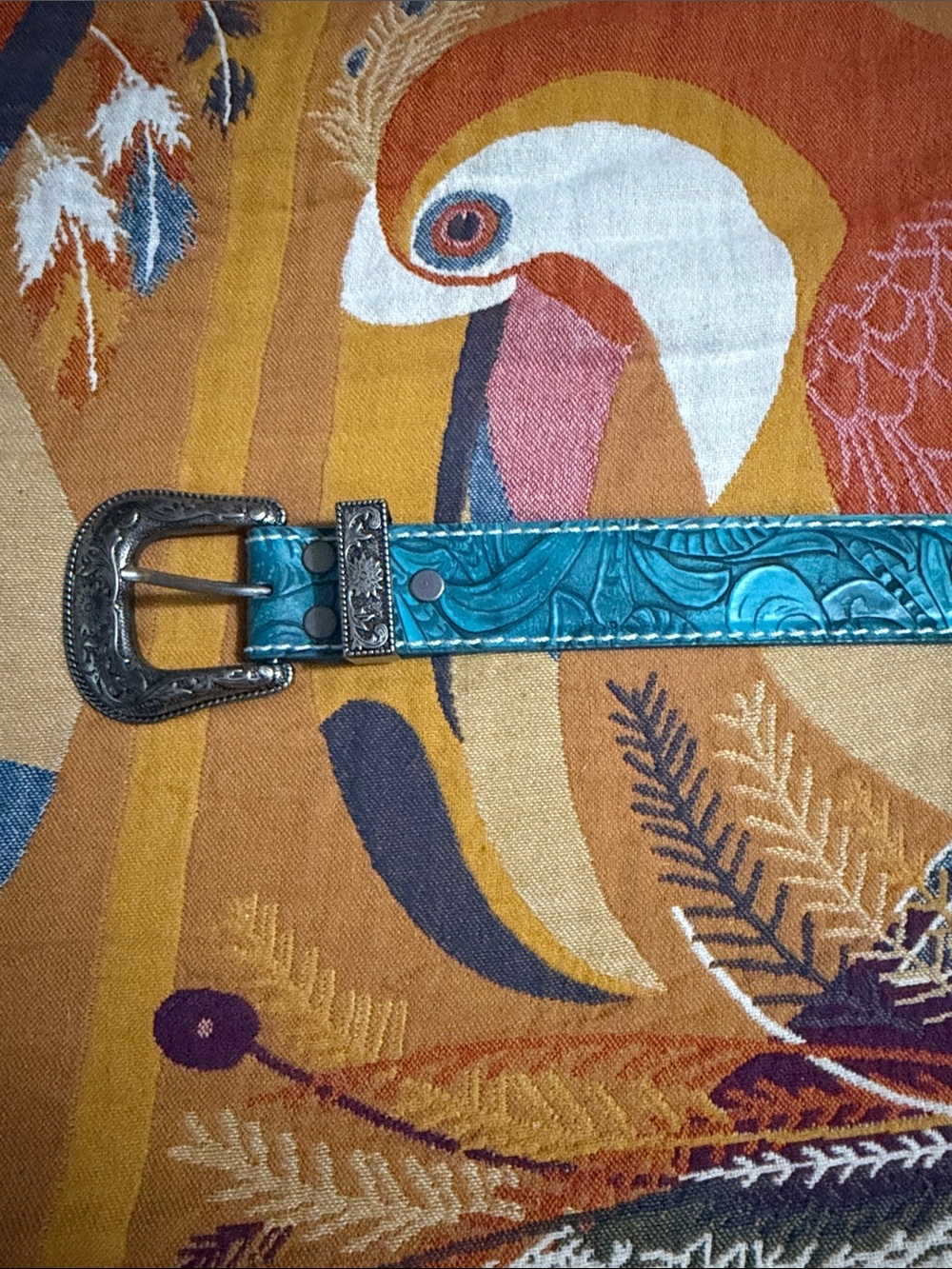 western tan and turquoise tooled leathern belt